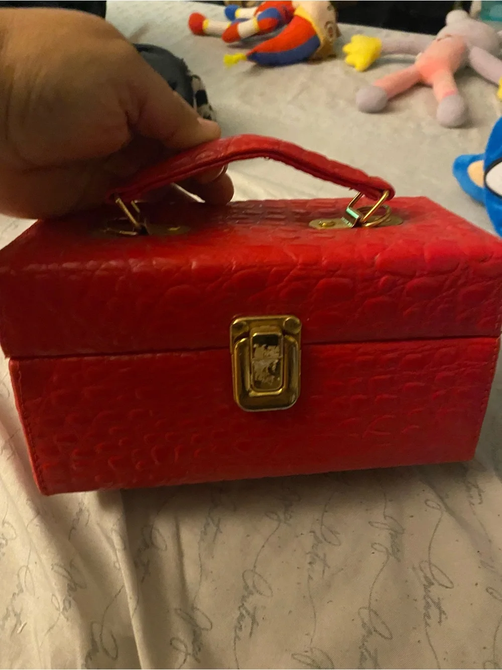 Red Textured Cosmetic Jewelry Case with Gold-Tone Clasp